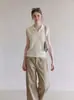 Colete de tricô oco com gola polo off-white estilo francês para mulheres, top fino sem mangas de verão de alta qualidade para figuras petites