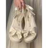 Laço Celebridade da Internet Solado Grosso Estilo Fada com Saia Sapatos Romanos para Mulheres 2024 Verão Novo Estilo Sandálias da Moda com Tiras