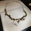 Acero de titanio piedra natural colgante de sol collar de acero inoxidable transfronterizo Maillard temperamento cadena de clavícula joyería nicho al por mayor