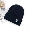 Gorro de punto de comercio exterior, versátil, a prueba de frío, color liso, gorro de otoño e invierno, gorro de lana para niños, fabricantes, en stock, gorro de punto tipo pullover, hombre