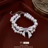 Pulsera y Collar de Doble Capa con Lazo de Perlas Cadena para Clavícula Estilo Palacio Francés Set de Joyería Versátil de Lujo Ligero para Mujeres