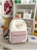 Mochila nueva de dibujos animados linda y dulce con bloques de color, transfronteriza, para estudiantes de jardín de infantes, mochila casual versátil para viajes