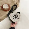 Bolsa de Hombro de Moda Casual Tejida con Letras y Corazones al por Mayor Tendencia 2025 Nueva Bolso de Mensajero de Moda para Mujer Lindo de PU para el Trabajo