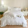 Conjunto de quatro peças de cor sólida de fio duplo de algodão puro classe A, estilo francês, algodão puro, estilo princesa, colcha com babados, lençol, roupa de cama nude para dormir