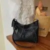 Bolso tejido retro de gran capacidad para mujer, nuevo bolso tote de moda coreana 2026, bolso grande simple para hombro o axila