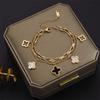 Pulseira de Aço Titânio Trevo de Quatro Folhas 2023 Nova Feminina Leve Luxo Moda Dupla Camada Versátil Pulseira de Grama da Sorte