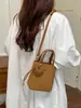 El bolso pequeño de moda de este año para mujer, perfecto para la primavera, versátil y elegante, nueva colección 2026, bolso cruzado sencillo, bolso tipo cubo tote estilo coreano