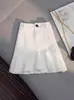 Saia Preta Assimétrica A-Line para Mulheres Primavera e Verão Novo Estilo Babados Cintura Alta Saia Quadril Anti-Exposição Look Emagrecedor Saia Curta