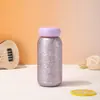 Taza de bolsillo de alta calidad con recubrimiento de titanio, compacta y mini, taza aislada de acero inoxidable 316, portátil, ligera y una taza de regalo de lujo personalizable.