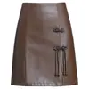 Saia de Couro PU Elegante e da Moda para Mulheres, Outono de 2026 Nova Cintura Alta Emagrecedora Cobre o Quadril Simples Cor Sólida Bodycon Curta