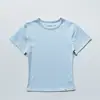 A Versão Correta do Novo Modelo Coreano 26, Semelhante ao Estilo de Jingnan, Blusa Versátil de Gola Redonda de Manga Curta Slim Fit com Etiqueta Aplicada