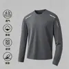 Camiseta de manga larga de otoño, capa base talla grande, cuello redondo para hombre, top simple y holgado, estilo coreano, camiseta estampada de moda