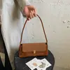 Bolsa de mão retrô de alta qualidade para mulheres, nova coleção outono/inverno 2026, bolsa de ombro Melard fashion, bolsa estilo baguette coreana