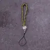 Atacado de fábrica cordão para celular couro PU couro chaveiro de câmera cordão corda de pulso para celular de casal corda trançada de couro