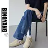Calça jeans americana de rua lavada e desgastada para homens, primavera e outono, corte reto e solto, estilo vibe high street europeu e americano, calça comprida