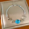 Pulsera ovalada hueca de circón vintage usada pulsera de lujo ligero de alta gama joya de mano exquisita versátil venta al por mayor