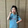 Conjunto para Niña 2026 Nuevo Estilo Camiseta de Manga Corta con Estampado de Corazón Azul y Letras para Niñas, Top Holgado Elegante de Verano