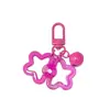 Estrella Hueca de Cinco Puntas Acrílica Campana Hebilla de Puerta de Llave Llavero Cabeza de Bolso Cubierta de Auriculares Colgante Pequeño Decorativo Joyería Colorido