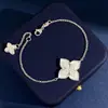 Venta Caliente Transfronteriza Diamante Trébol de Cuatro Hojas Sentido Destello Chapado en Diamante Oro de 18 Quilates Incrustado Flor de Fritillaria Blanca Flor de Princesa Pulsera Femenina INS