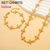 Set de Collar y Pulsera de Acero de Titanio Hueco con Cruz de Lujo Ligero Europeo y Americano, Color Dorado, Joyería Retro de Nicho de Gama Alta al por Mayor