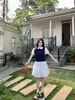Camisa de Punto Patchwork con Bloques de Color Estilo Universitario Coreano Talla Grande, Falda Midi Versátil Minimalista de Cintura Alta