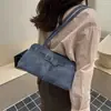 Diseño de nicho muy elegante 2026 verano nueva tendencia de moda simple chic versátil bolso de hombro transfronterizo