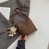Bolso Cubo para Mujer 2026 Primavera Nuevo Bolso de Nicho para Mujer de Alto Valor Estampado de Leopardo Elegante Bolso de Hombro Cruzado Pequeño