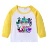 Camiseta infantil de primavera y otoño 2023, nueva camiseta de manga larga con cuello redondo y dibujos animados, camiseta de algodón para bebés y niños.