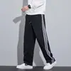 Nuevos pantalones de chándal anchos de pierna recta holgados y fluidos para estudiantes deportivos para hombre, otoño e invierno 2026