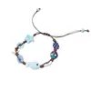 Pulsera trenzada con botón de estrella de mar azul claro y tablero de ajedrez 2025 Nuevo estilo festivo Joyería pequeña y fresca para la playa