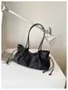 Bolso de axila retro casual de alta gama para mujer, nuevo bolso tote de diseño de nicho elegante, bolso de hombro y de mano
