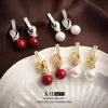 Brincos de pérola com nó cravejado de diamantes estilo francês para mulheres, estilo socialite elegante, clipes de orelha espirais, brincos de design único e estiloso