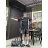 Calça Bermuda Casual com Estampa de Anjo Rezando, Tendência High Street Americana, para Homens e Mulheres, Nova Coleção de Verão, Solta e Versátil