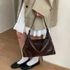 Bolsas femininas de nicho de alta qualidade Outono/Inverno 2026 Nova Bolsa Transversal de Ombro Único Versátil para Trabalho na Axila Bolsa Dumpling