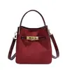 Bolso tipo cubo liso, simple y casual, bolso de hombro para mujer, nuevo estilo 2026, adecuado para el trabajo y los desplazamientos, un bolso cruzado moderno y elegante