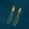 Pendientes Colgantes Esmeralda Vintage de Qingdao Pendientes Artísticos Retro de Nicho Pendientes de Botón Versátiles de Moda Sensación de Lujo Ligero de Alta Gama