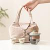 Juego de té de viaje kung fu de flor de durazno de fábrica traje para exteriores anti-caliente mano té taza rápida una tetera dos tazas bolsa portátil