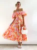 Plataformas Europeas y Americanas Nueva Colección Primavera y Verano Venta Caliente Vestido con Falda de Globo Estampada Hombros Descubiertos y Mangas Abullonadas para Mujer 2026