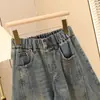 Calça jeans masculina lavada retrô para primavera e outono, tamanho grande, com design dividido tridimensional, estilosa e confortável, calça harém de corte solto