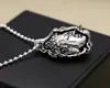 Venta al por mayor de fábrica colgante de plata de ley S925 Buda mágico entre el colgante de plata tailandesa retro creativo para hombres y mujeres con colgante