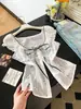 Camisa de manga corta con retazos de lunares en dos tonos, imitación de dos piezas, para mujer, top corto de verano ajustado con fruncido en la cintura, hueco