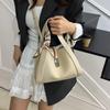 Bolsa de Mão Textura High-End Feminina 2025 Nova Nicho Ombro Único Bolsa Balde Transversal Cesto de Legumes Bolsa Tote Commuter