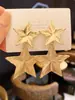 Corea del Sur Dongdaemun Estrella de Metal Estrella de Cinco Puntas Pendientes para Mujer Exagerados Distintivos de Alta Gama Lujo Ligero Pendientes Grandes