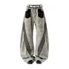 Jeans unisex de pierna ancha, casual, nuevos para primavera/verano, con estampado de leopardo retro transfronterizo, retazos y tres rayas, pierna curva