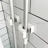 Nuevo clip de pared para mopa, gancho sin taladro para pared de baño, estante de almacenamiento para escobas, soporte para mopa