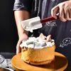 Varios estilos y especificaciones de espátulas de silicona, espátulas para hornear pasteles, cuchillos de goma y espátulas de crema integradas