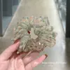 Selección PremiumElásticos elegantes y con estilo, nueva colección de accesorios para el cabello de nicho de alta gama para recoger el cabello en la parte posterior de la cabeza