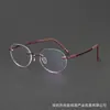 Montura de gafas estilo Xerox marco de titanio 5573BI montura de gafas literarias ovaladas sin montura hombres pueden equiparse con lentes bloqueadoras de luz azul mujeres