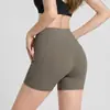Shorts de yoga de cintura alta para realzar glúteos con bolsillos, shorts deportivos para fitness, pantalones deportivos de tres cuartos de secado rápido para glúteos de durazno para mujer, primavera/verano