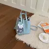 Bolso transfronterizo para mujer, diseño simple, alta calidad, nicho, nuevo de primavera 2026, bolso cubo, bandolera bajo el brazo